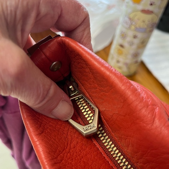 MCM Orange embossed leather handbag EUC - Picture 9 of 12
